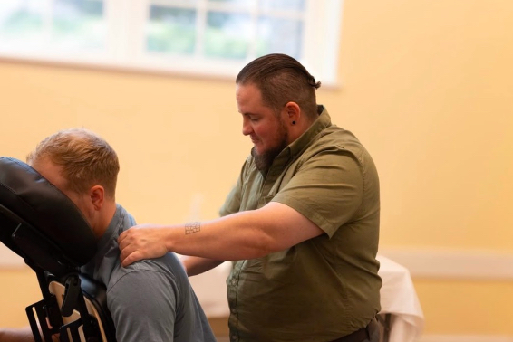 Travis giving a massage