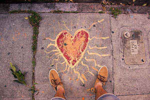 Overhead vew of chalk art in the shape of a heart