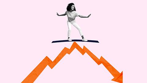 Image of a person surfing on an animated image of a graph line.